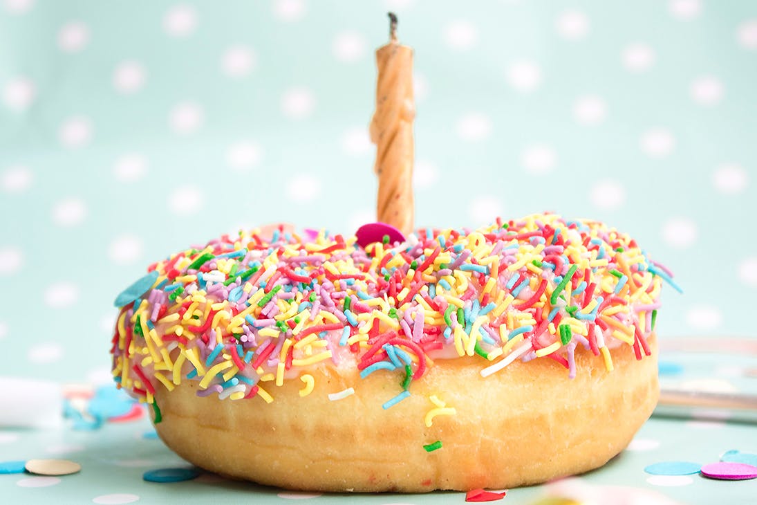 A doughnut with a candle